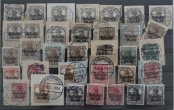 1916-1918, Partie mit über 40 losen Marken und Briefstücken, meist ...