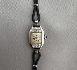 WEISSGOLD-ARMBANDUHR "ESZEHA " mit 12 kl. Diamanten bestückte 750er ...