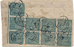 Block of nine of ½ anna blue on large part of native envelope. Two ...