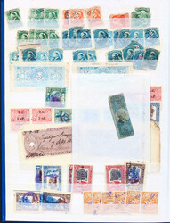 ALLE WELT STEUERMARKEN: 1865/1940 ca., gr. Steckbuch mit ca. 750 ...