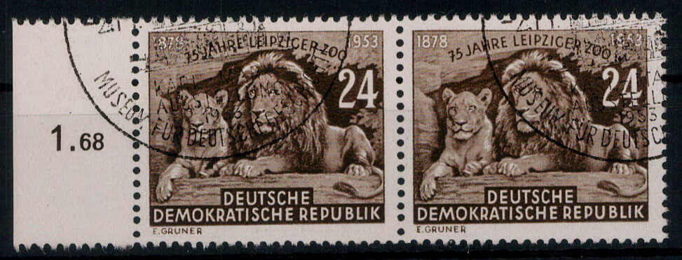 24 Pf. Löwenpaar im waagrechten gestempelten Paar, linker Wert mit ...