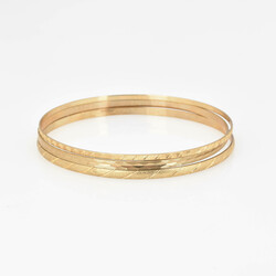 Drei Armreife Gelbgold Gelbgold 333, je schmaler Schlupfreif, teils ...