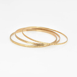 Drei Armreife Gelbgold Gelbgold 333, je schmaler Schlupfreif, teils ...