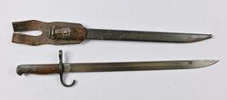 Bayonet with number, metal scabbard and frog. Length ca. 52,5 cm. ...