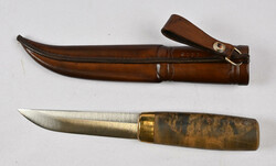 Knife with sheath marked “Elk” and “2009.” Normal signs of use