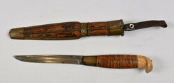 Old knife with an unusual sheath. Normal signs of use