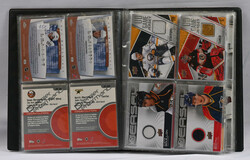 Jersey cards in a small album, 40 cards