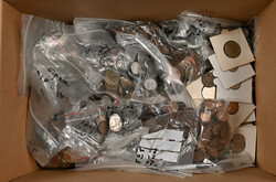 Selection of Finnish coins in a box, including also some medals. ...