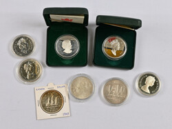 Canada 1985, 1990 and 1991 coin sets with two silver dollars. In ...