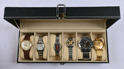 Watch box with beautiful selection of working wristwatches. Six ...