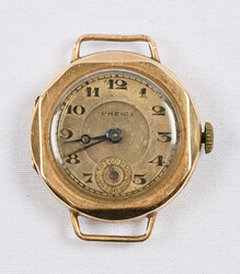 Phenix gold watch (14 k), working condition unknown. In addition ...