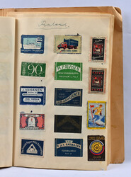 Old matchbox labels in a booklets, glued on pages. Finnish as well as ...