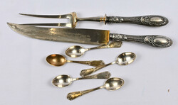 Old tableware with silver ends and five small spoons with ...