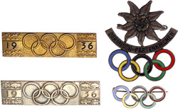 8 versch. Medaillen und Abzeichen zu den olymp. Spielen 1936 in ...