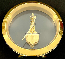 JAEGER LE COULTRE Tischuhr, Messing/Glas. Durchmesser 12,5 cm. ...