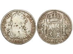 8 Reales. 1786. MÉXICO. F.M. 26,44 grs. Múltiples resellos chinos. ...