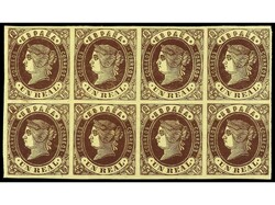 ESPAÑA. 1 real castaño s. amarillo. Bloque de ocho, un sello con ...