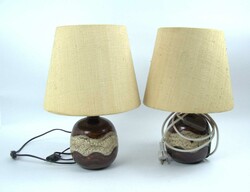 A pair of vintage lamps, ceramic base, brown glaze, and fabric shade. ...