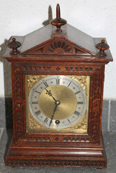 Antique table clock with decorative pendulum, wooden case, ...
