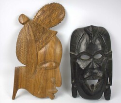 Afrika, 2 Wandmasken aus Holz. 1x Höhe ca. 29,5 cm, Breite ca. 16,5 ...