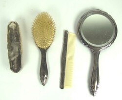 Hairdressing set consisting of a brush, comb, clothes brush, and ...