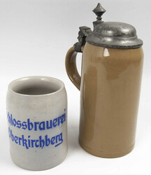 Two stoneware beer steins, different models. One from the ...