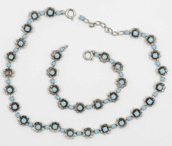 2 pieces of fashion jewelry: necklace with matching bracelet.