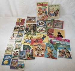 A collection of children's books and booklets. Also included are ...