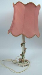 Vintage table lamp in a classic/romantic style. Wavy pink fabric ...