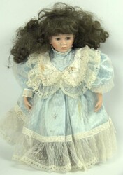 Antique collector's doll in a blue frilly dress. Head, hands, and ...
