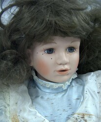 Antique collector's doll in a blue frilly dress. Head, hands, and ...