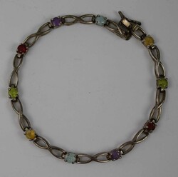 925er Silber Armband mit verschieden farbigen Steinchen. Länge ca. ...