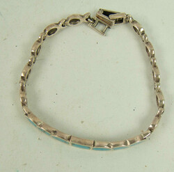 Armband mit Türkis, Silber geprüft. Länge ca. 19 cmAutomatically ...