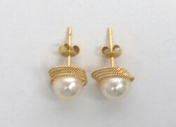 Earrings, 18 karat yellow gold, each set with a pearl