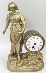 Mantel clock, restoration object. Plaster figure with clockwork. ...