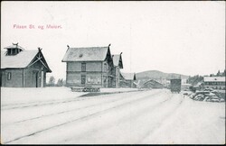 FLISEN St. og Meieri. Vintermotiv med togvogn og bygningsmasse (L-N ...