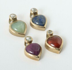 4 Herzanhänger 20. Jh., 4 Anhänger in Herzform mit eingefassten ...