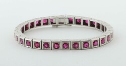 Armband mit Rubinen 20. Jh., Armband in Weißgold 585, bes. mit 30 ...