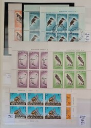 BOOKLETS, MINIATURE SHEETS & YEAR BOOKS: A carton containing an ...