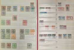 BRITISH COMMONWEALTH: Two stock books holding a qty of early to ...