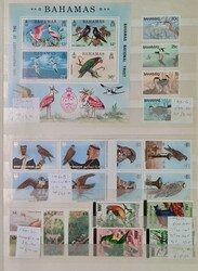 BIRDS: Large stock book holding an unmounted mint collection ...