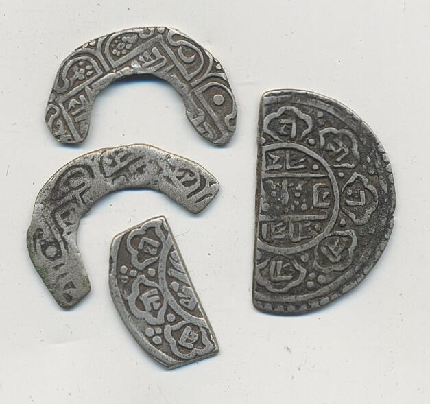 Nepal, Four cut pieces from silver coins. Total weight 7.65 g