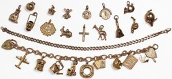 Gold charm bracelet (170mm 9ct 19.78g) with assorted charms attached ...