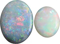 Coober Pedy (SA) white solid ovals, total 4 carats. (2)