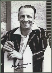 DON BRADMAN: Superb signed photograph affixed inside book 'Bradman - ...