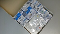 MÜNZKAPSELN: Posten in einer Pappschachtel, teilweise ...